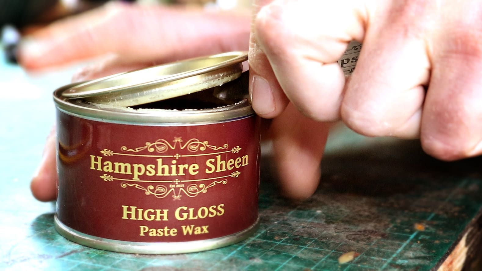 Opening a tin of Hampshire Sheen Gloss Finishing Wax